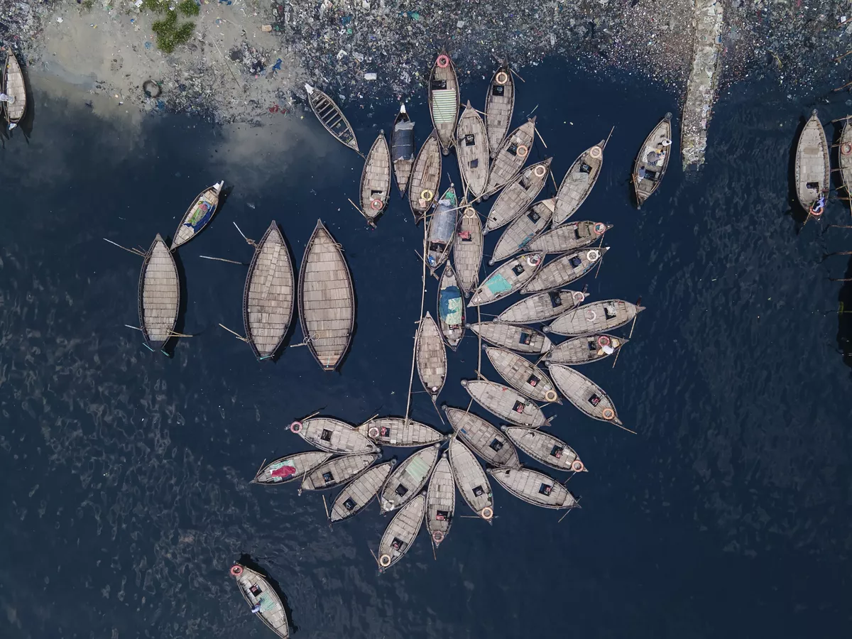 Aerial view of Wooden passenger boats along the Buriganga River, Sadarghat, Dhaka, Bangladesh - © Muhammadamdadphoto - stock.adobe.com